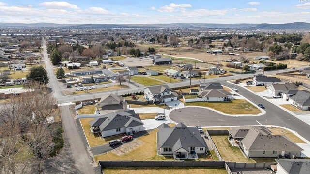 aerial view with a residential view and a mountain view