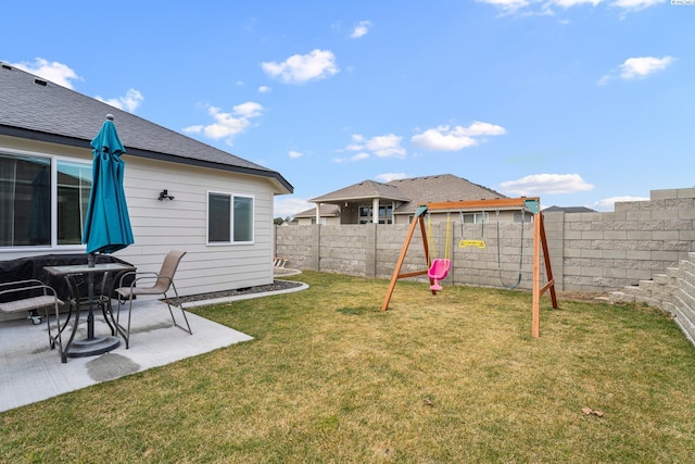 view of yard with a patio and a fenced backyard