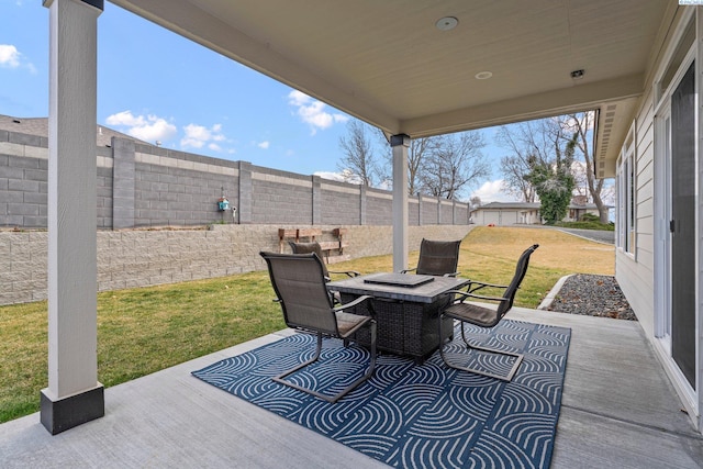 view of patio / terrace with outdoor dining area and a fenced backyard