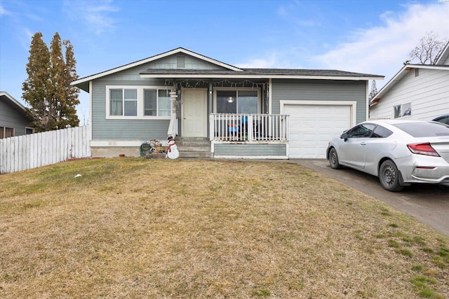 ranch-style home featuring aphalt driveway, an attached garage, covered porch, fence, and a front lawn