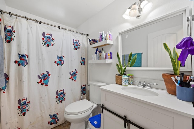 full bath with a shower with curtain, vanity, and toilet