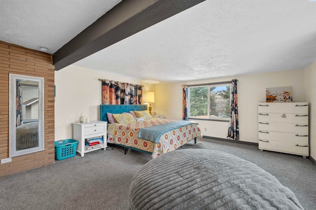 carpeted bedroom with beam ceiling and a textured ceiling