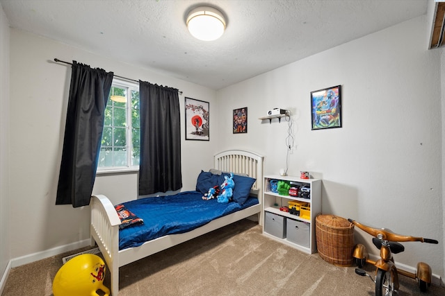 4403 S Ione St, Kennewick, WA 99337 - carpeted bedroom with baseboards and a textured ceiling
