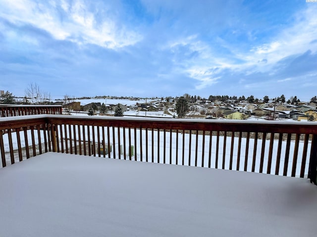 view of snow covered deck