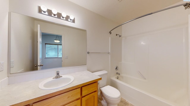 full bathroom featuring vanity, toilet, and  shower combination