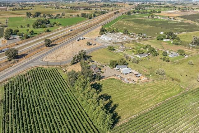 birds eye view of property featuring a rural view