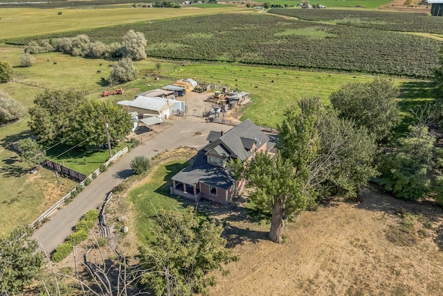 birds eye view of property featuring a rural view