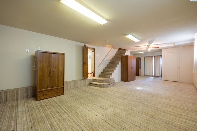 basement featuring ceiling fan