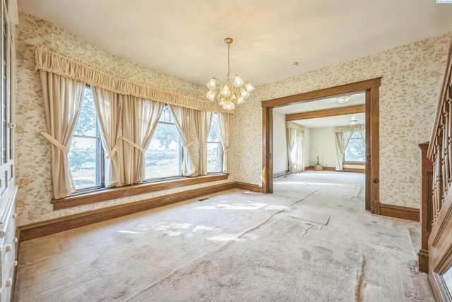 unfurnished dining area with light colored carpet and a notable chandelier