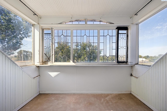 unfurnished sunroom with a wealth of natural light