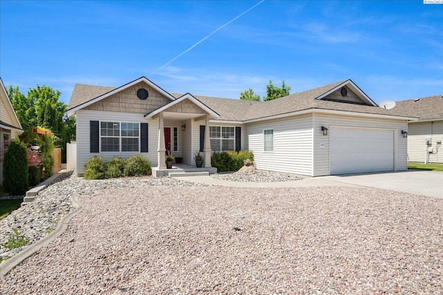 1565 Foxglove Ave, Richland, WA 99352 - single story home with an attached garage, concrete driveway, and a shingled roof