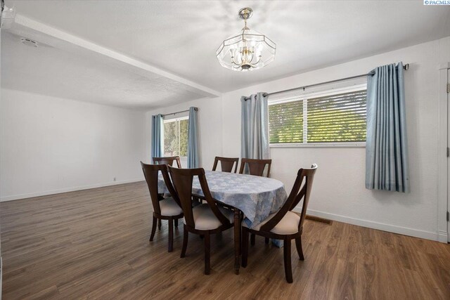1925 Everest Ave, Richland, WA 99354 - dining area featuring a chandelier, plenty of natural light, wood finished floors, and baseboards