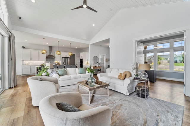 6514 Eagle Crest Dr, Pasco, WA 99301 - living area with recessed lighting, light wood-type flooring, a ceiling fan, and high vaulted ceiling