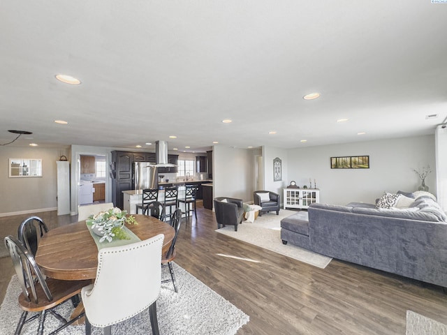 dining space featuring dark hardwood / wood-style flooring