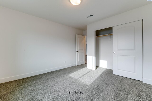 2880 S Osborne St, Kennewick, WA 99338 - unfurnished bedroom with a closet, visible vents, baseboards, and carpet