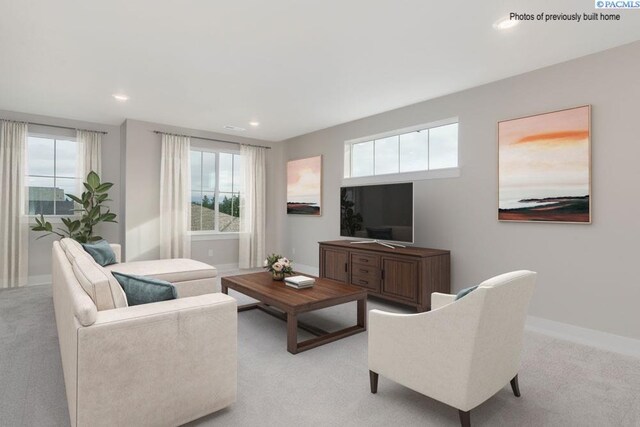 2816 Avrio Ave, Richland, WA 99354 - living room featuring light colored carpet, healthy amount of natural light, baseboards, and recessed lighting