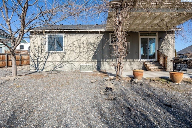 view of front of home with fence