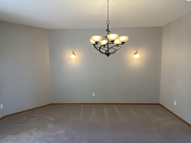 2665 Maidstone St, Richland, WA 99354 - carpeted spare room featuring a chandelier and baseboards