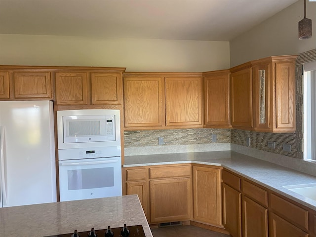 2665 Maidstone St, Richland, WA 99354 - kitchen featuring white appliances, decorative backsplash, light countertops, and tile patterned floors