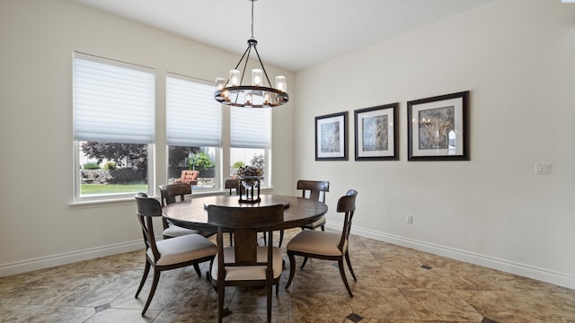 3304 Sorento Ct, Pasco, WA 99301 - dining area with a chandelier and baseboards
