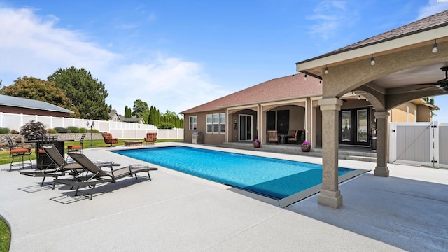 3304 Sorento Ct, Pasco, WA 99301 - view of pool with a patio area, a gate, a fenced backyard, and french doors