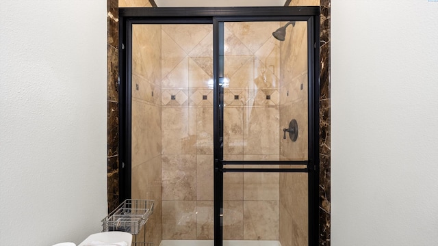 3304 Sorento Ct, Pasco, WA 99301 - bathroom view of a stall shower, toilet, and a textured wall