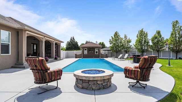 3304 Sorento Ct, Pasco, WA 99301 - view of pool featuring a patio area and an outdoor fire pit