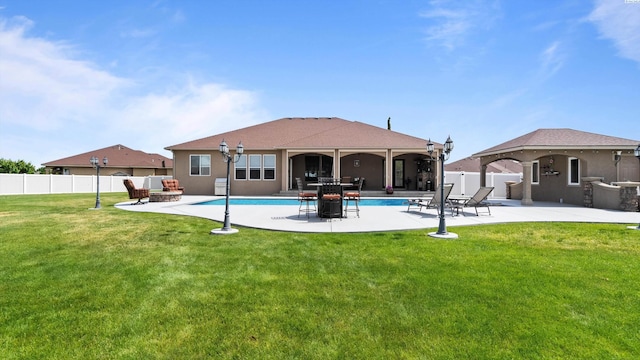 3304 Sorento Ct, Pasco, WA 99301 - back of property with a patio area