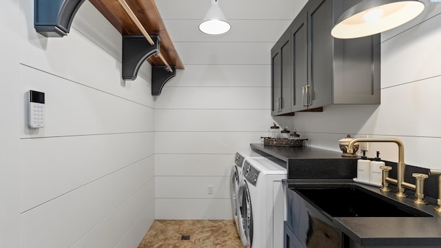 3304 Sorento Ct, Pasco, WA 99301 - washroom with washer and clothes dryer and cabinet space