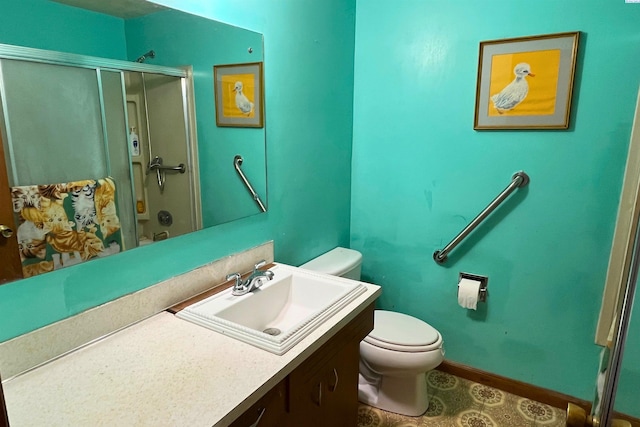 bathroom featuring an enclosed shower, toilet, baseboards, and vanity
