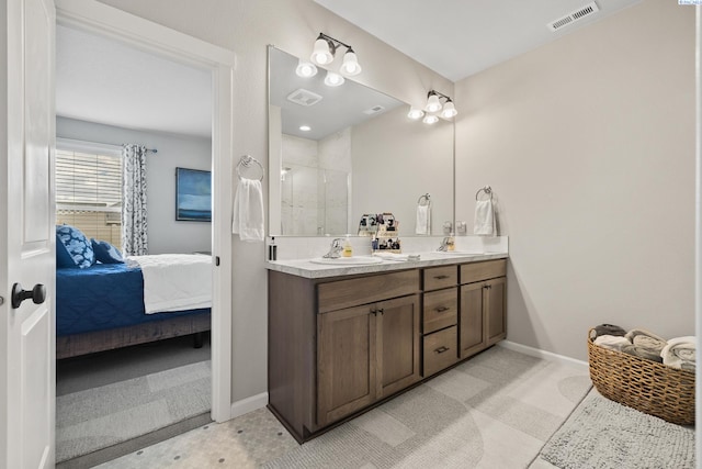 bathroom with vanity and walk in shower