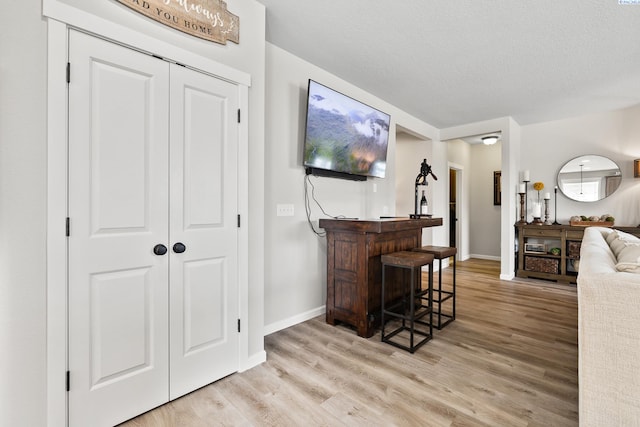 1409 Centennial Ave, Sunnyside, WA 98944 - indoor dry bar with light wood finished floors and a textured ceiling