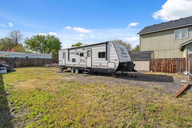 view of shed featuring a fenced backyard