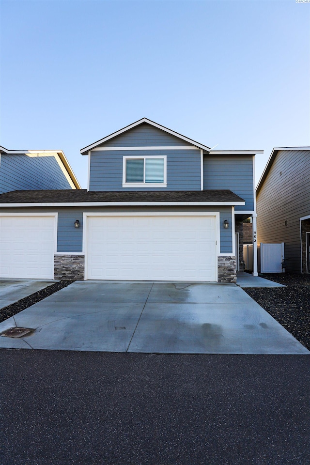 view of front of house with a garage