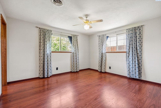 1815 W 16th Ave, Kennewick, WA 99337 - spare room featuring wood finished floors and ceiling fan