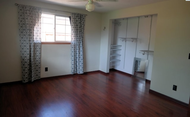 1815 W 16th Ave, Kennewick, WA 99337 - unfurnished bedroom featuring wood finished floors, baseboards, ceiling fan, and a closet