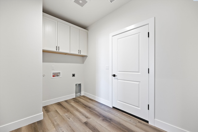 laundry area with visible vents, light wood-style floors, hookup for a washing machine, cabinet space, and electric dryer hookup