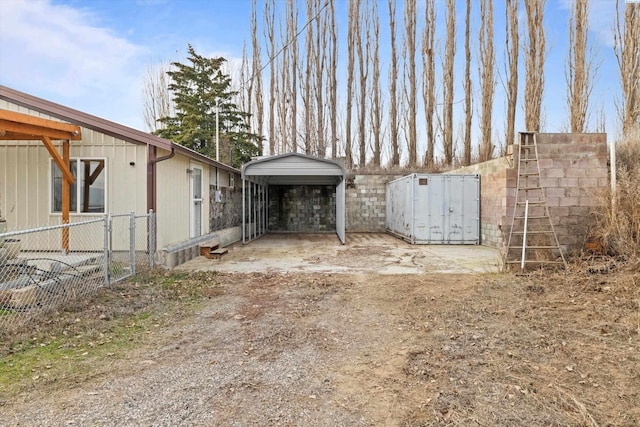 view of property exterior with a carport