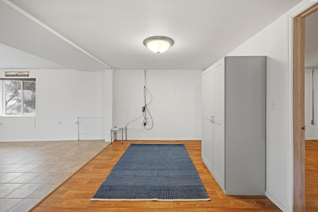 workout room with wood-type flooring