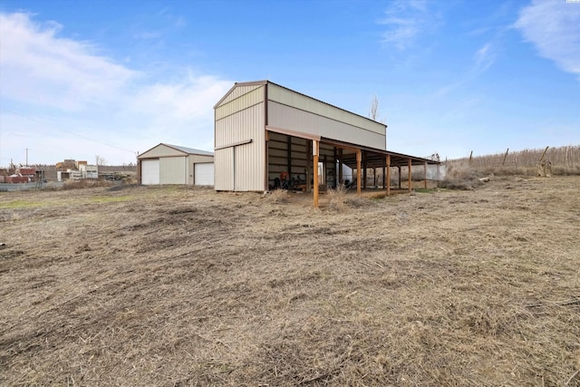 view of outbuilding with a garage