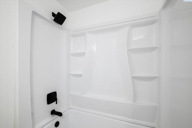 bathroom with shower / bathing tub combination