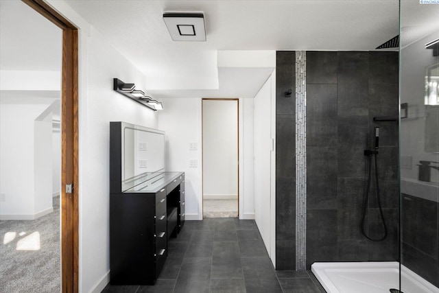 bathroom featuring walk in shower and baseboards