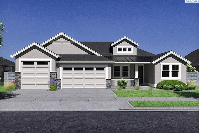 craftsman inspired home with a garage and covered porch