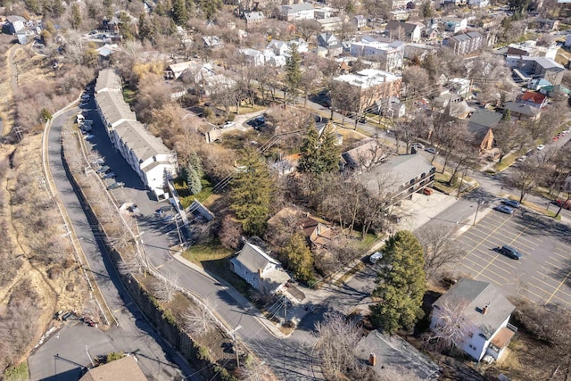 birds eye view of property with a residential view