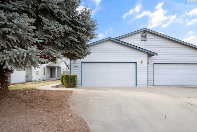 ranch-style house featuring a garage