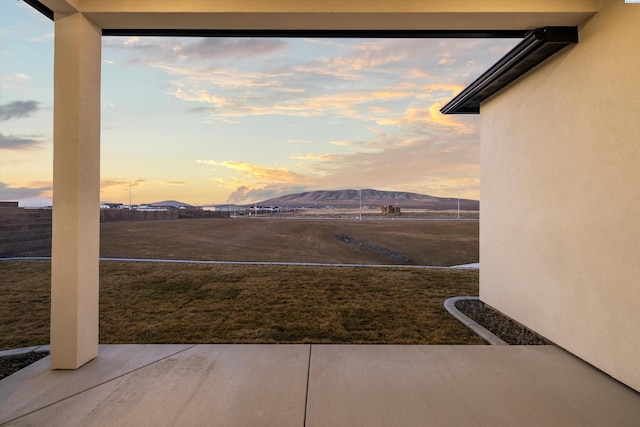 yard at dusk with a mountain view