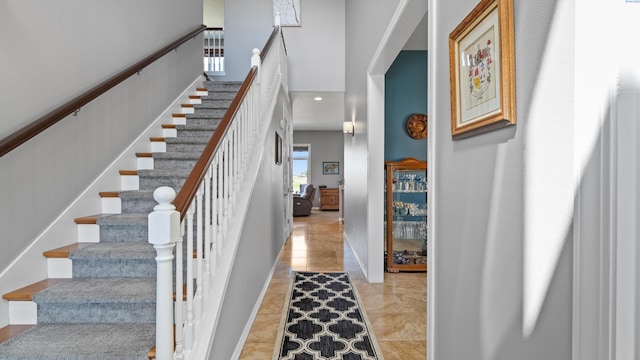 2876 Crosswater Loop, Richland, WA 99354 - stairway with baseboards, a towering ceiling, and recessed lighting