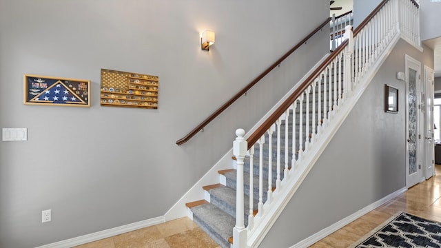 2876 Crosswater Loop, Richland, WA 99354 - stairs with baseboards and a high ceiling