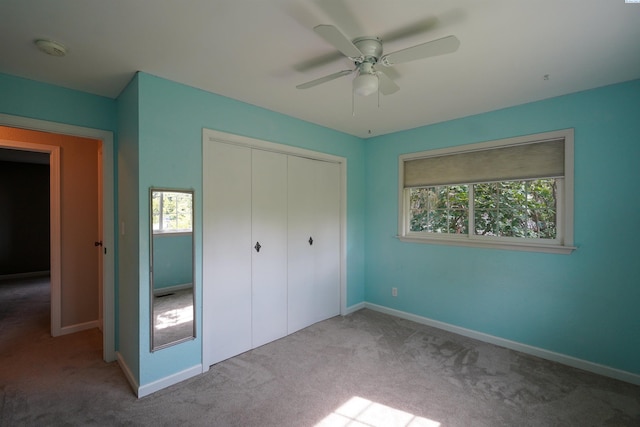 610 Dilke St, Pullman, WA 99163 - unfurnished bedroom with carpet flooring, a closet, and a ceiling fan