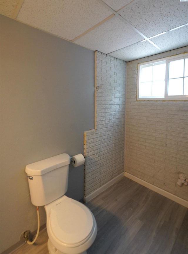 610 Dilke St, Pullman, WA 99163 - bathroom featuring a drop ceiling and wood finished floors
